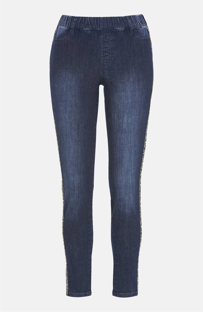 Läs mer om Stretchiga jeggings med leopardrevärer