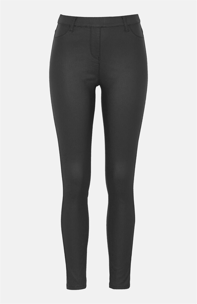 Läs mer om Stretchiga treggings med vaxad yta