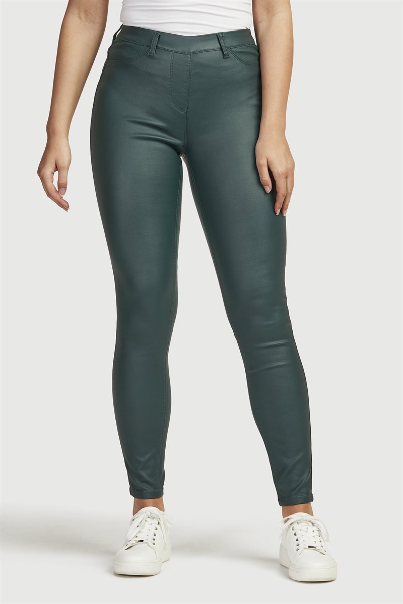 Läs mer om Stretchiga treggings med vaxad yta