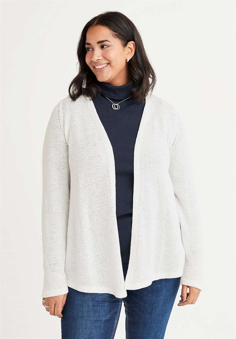 Läs mer om Stickad cardigan