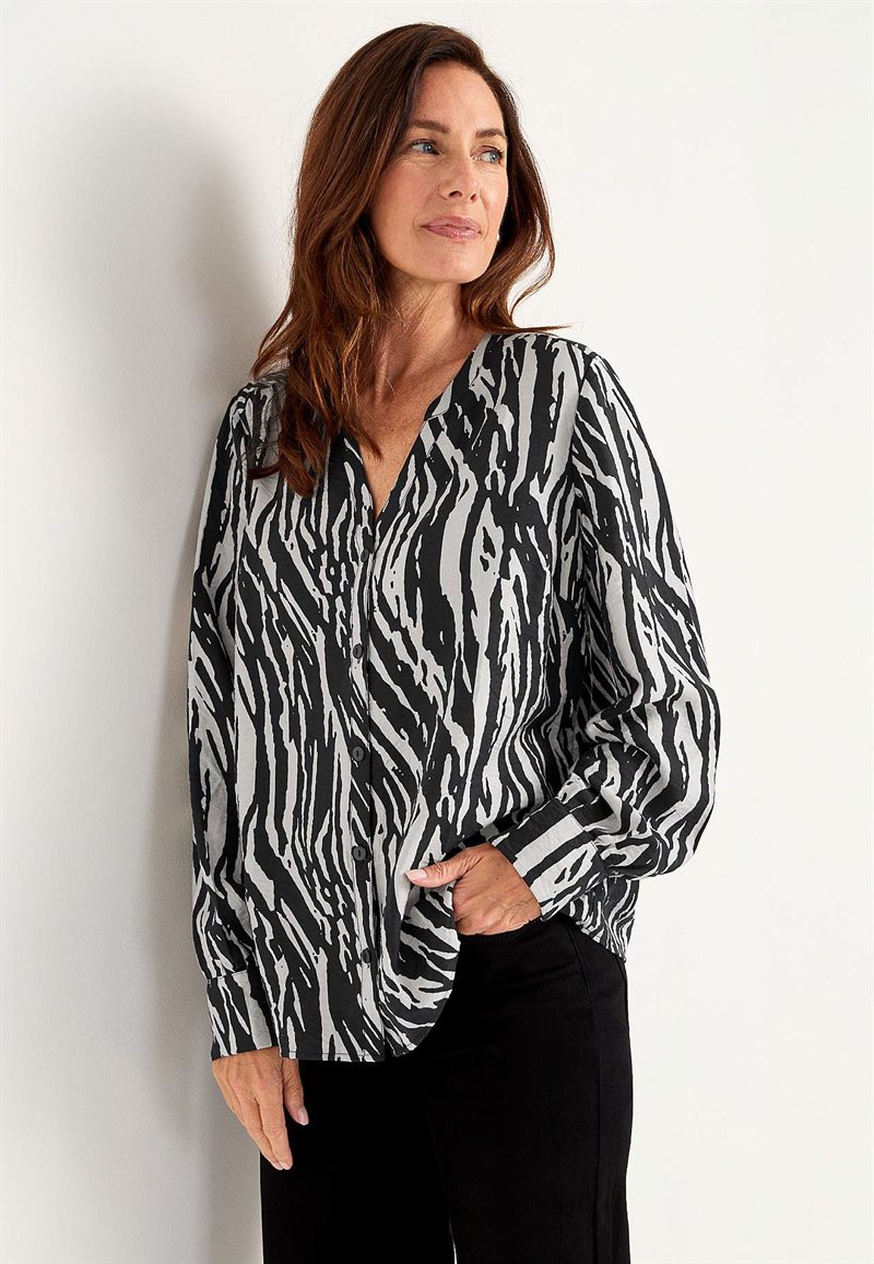 Vävd blus med knappar