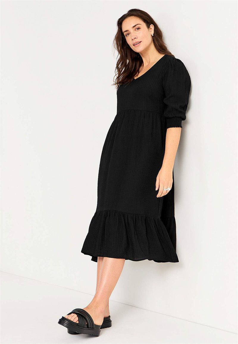 Vävd klänning med volang Sofie