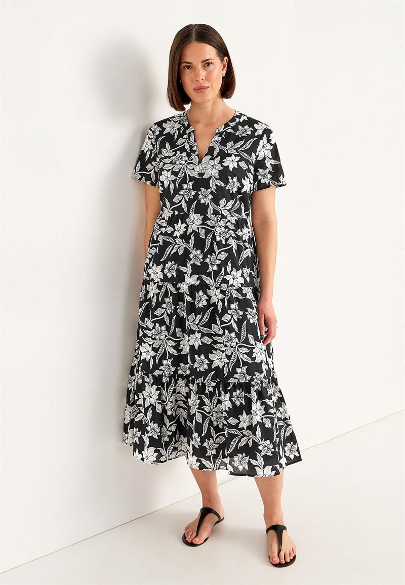 Bomullsklänning med volang