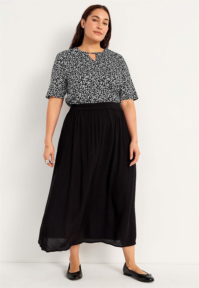 Kortärmad trikåtopp