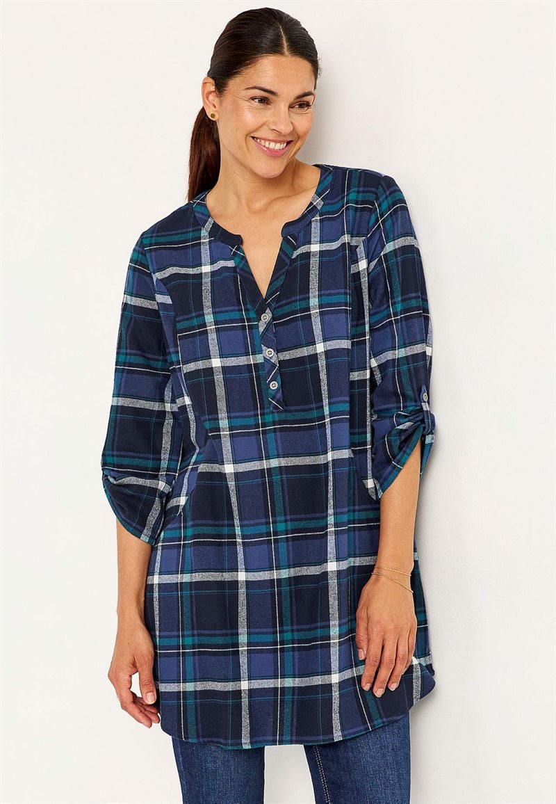 Tunika i flanell med fickor