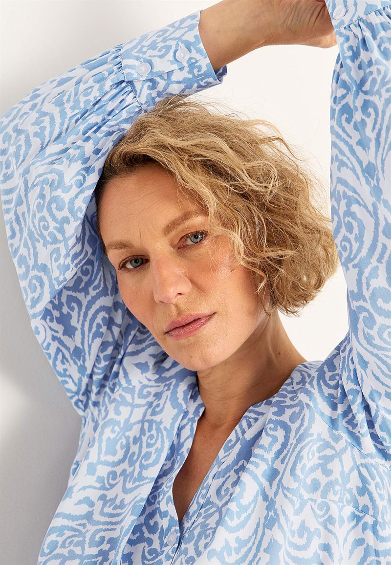 VÃ¤vd tunika med knappar