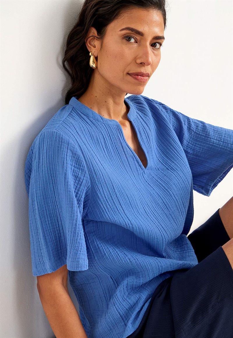 Blus i krinklad bomull