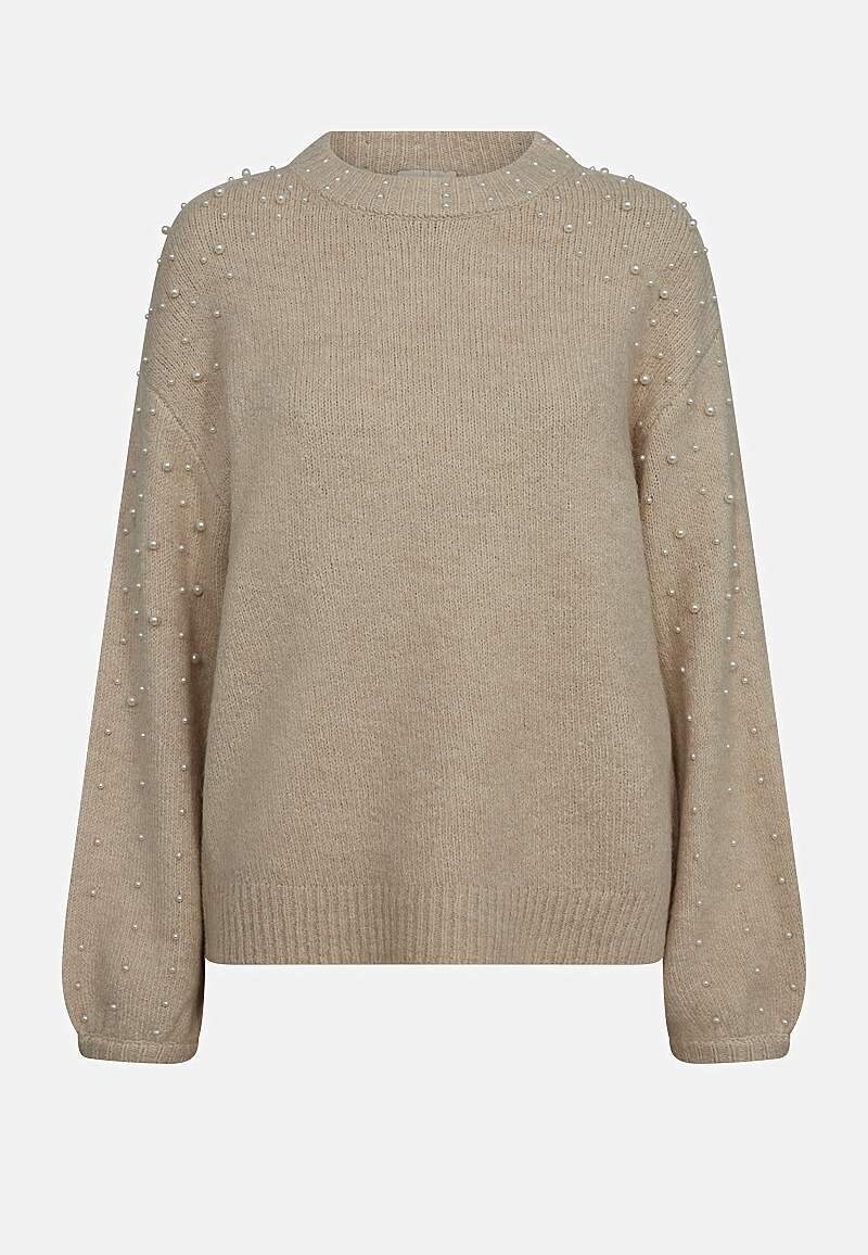 Stickad tröja med pärlor