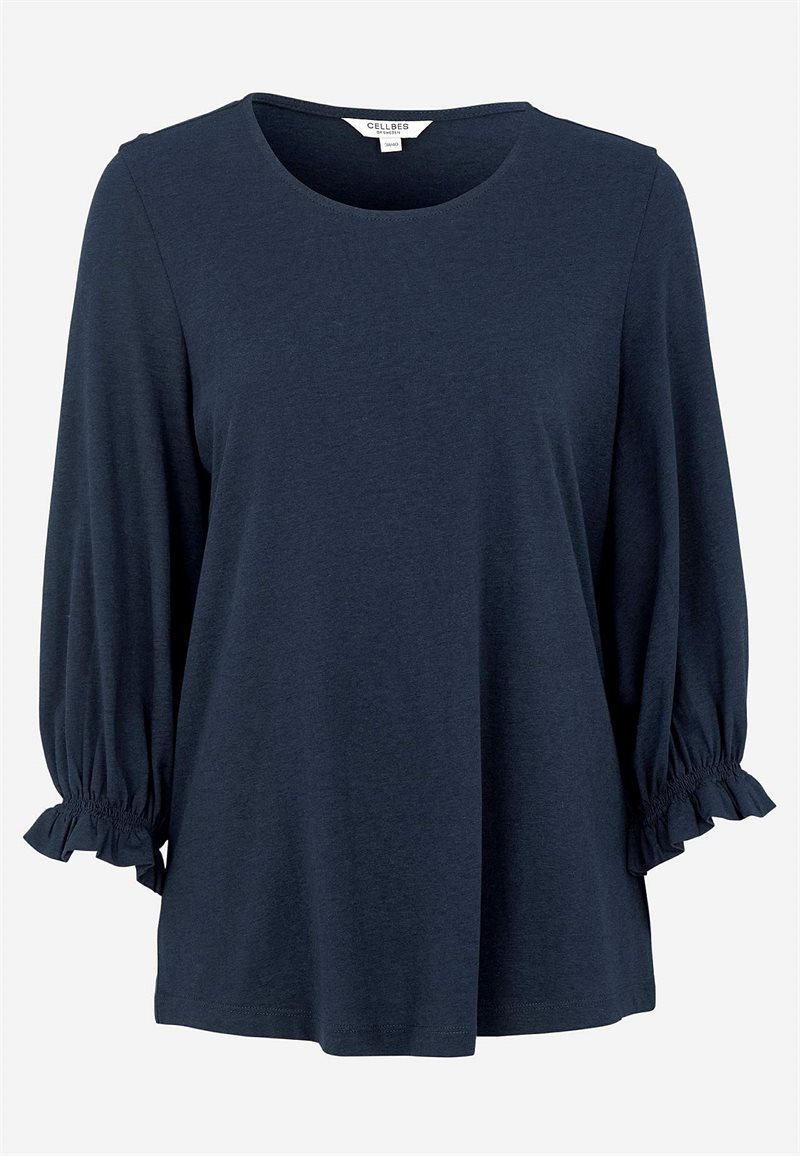 Trikåtopp med smockdetalj