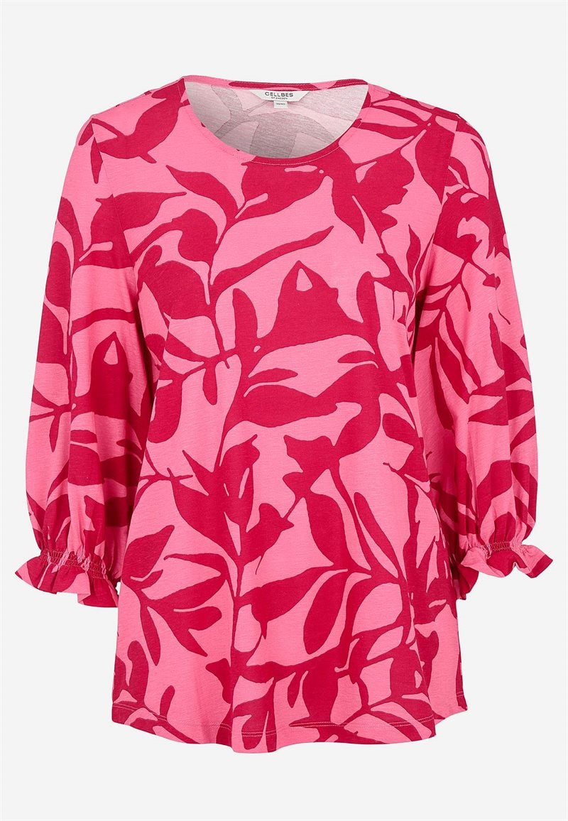 Trikåtopp med smockdetalj