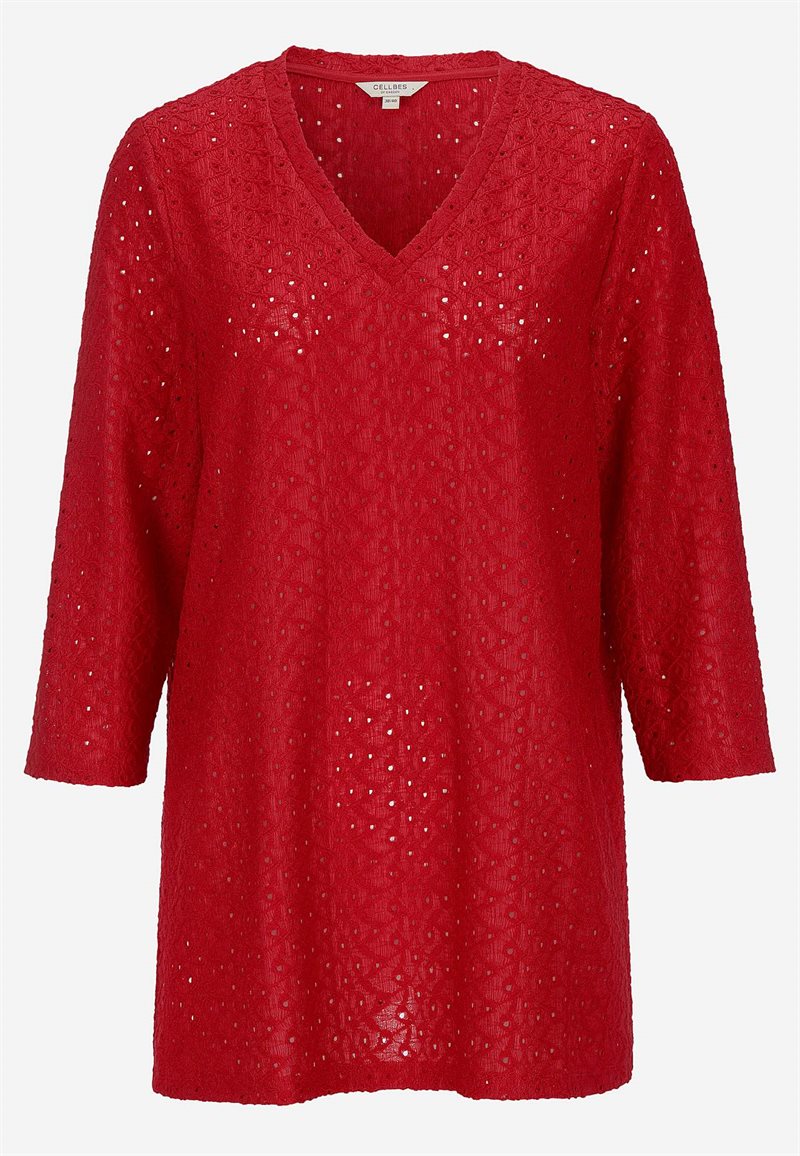 Topp med hålmönster