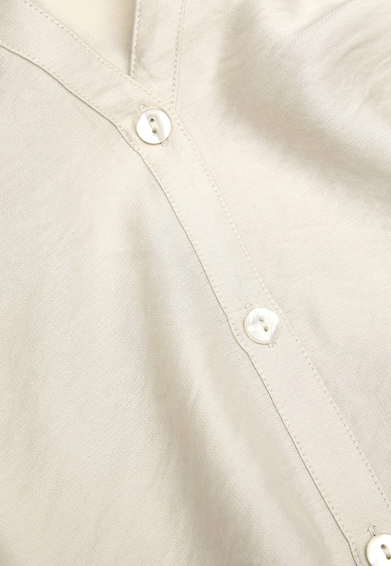 Vävd blus med knappar