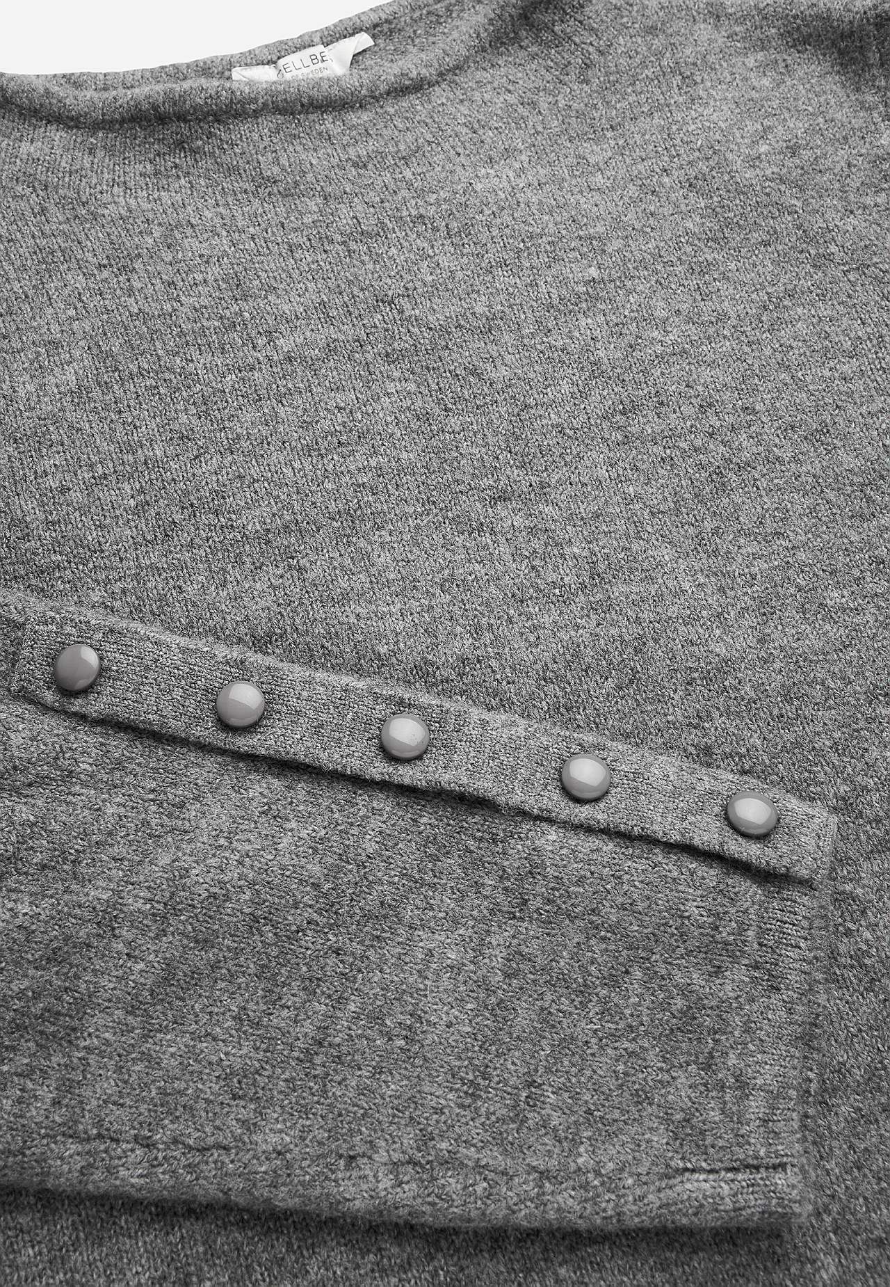 Stickad tunika med slits
