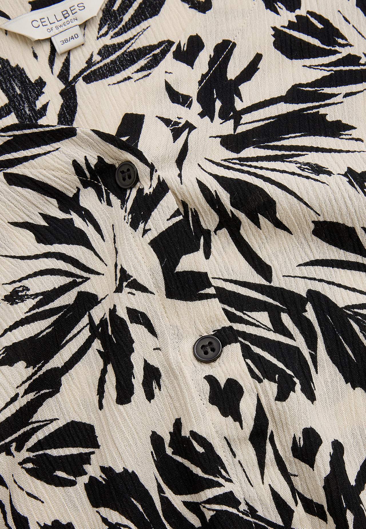Blus med crepe-kvalitet