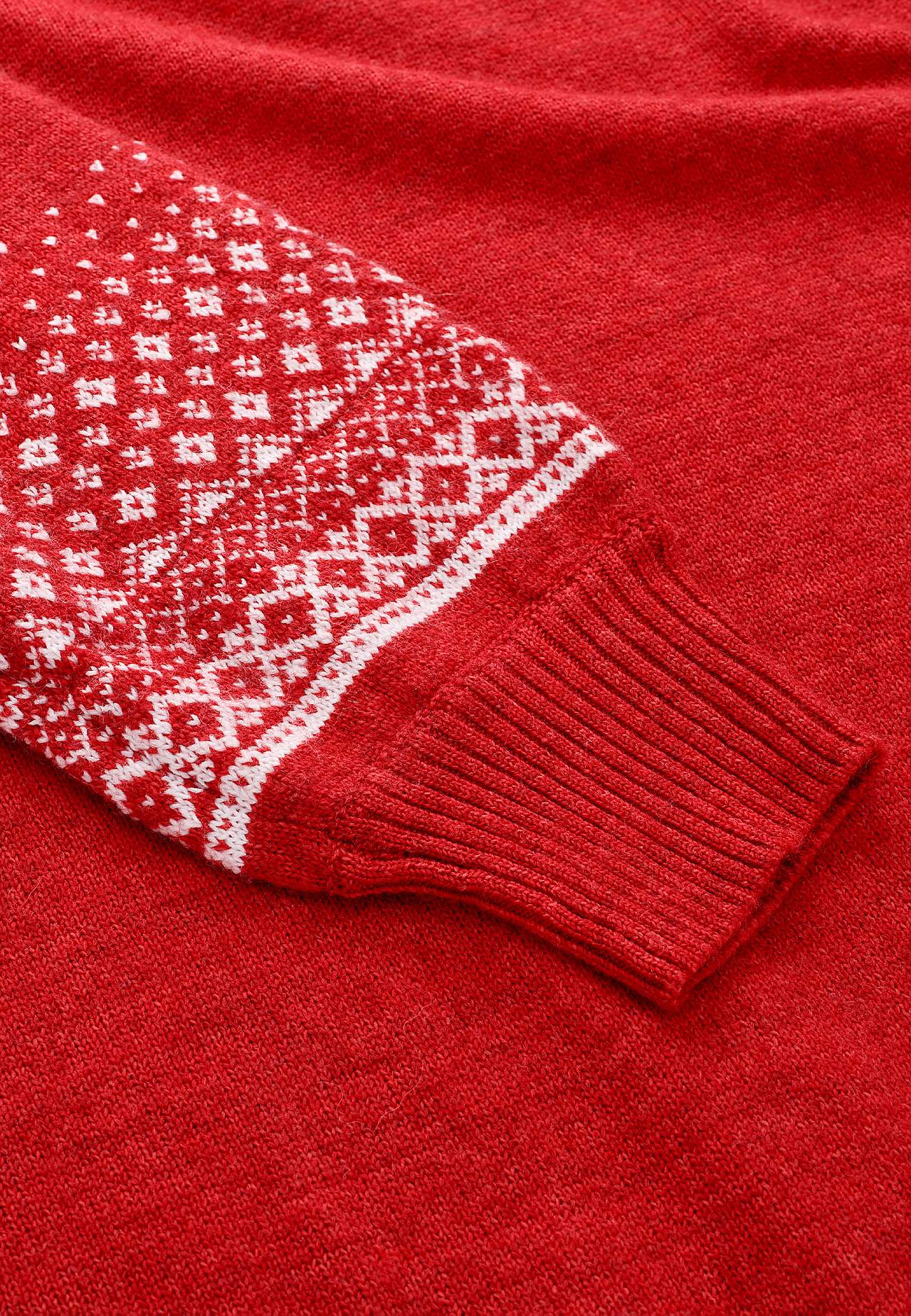 Stickad klänning med jacquardmönstrade ärmar