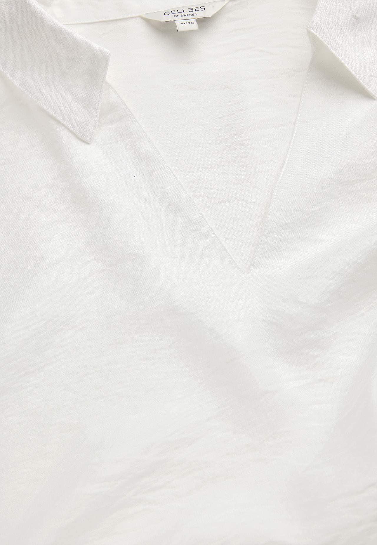 Vävd blus med vida ärmar