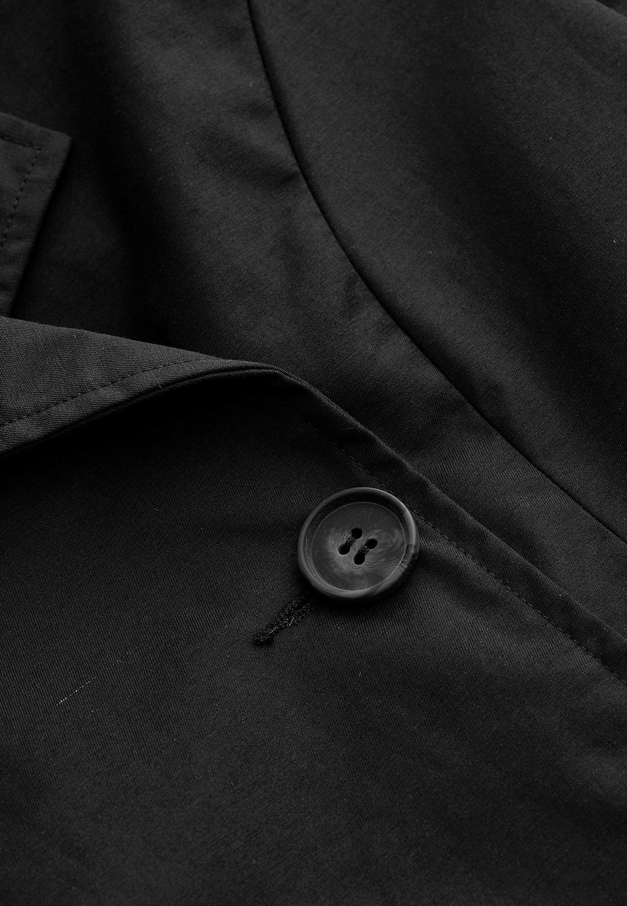 Dubbelknäppt, kort trenchcoat