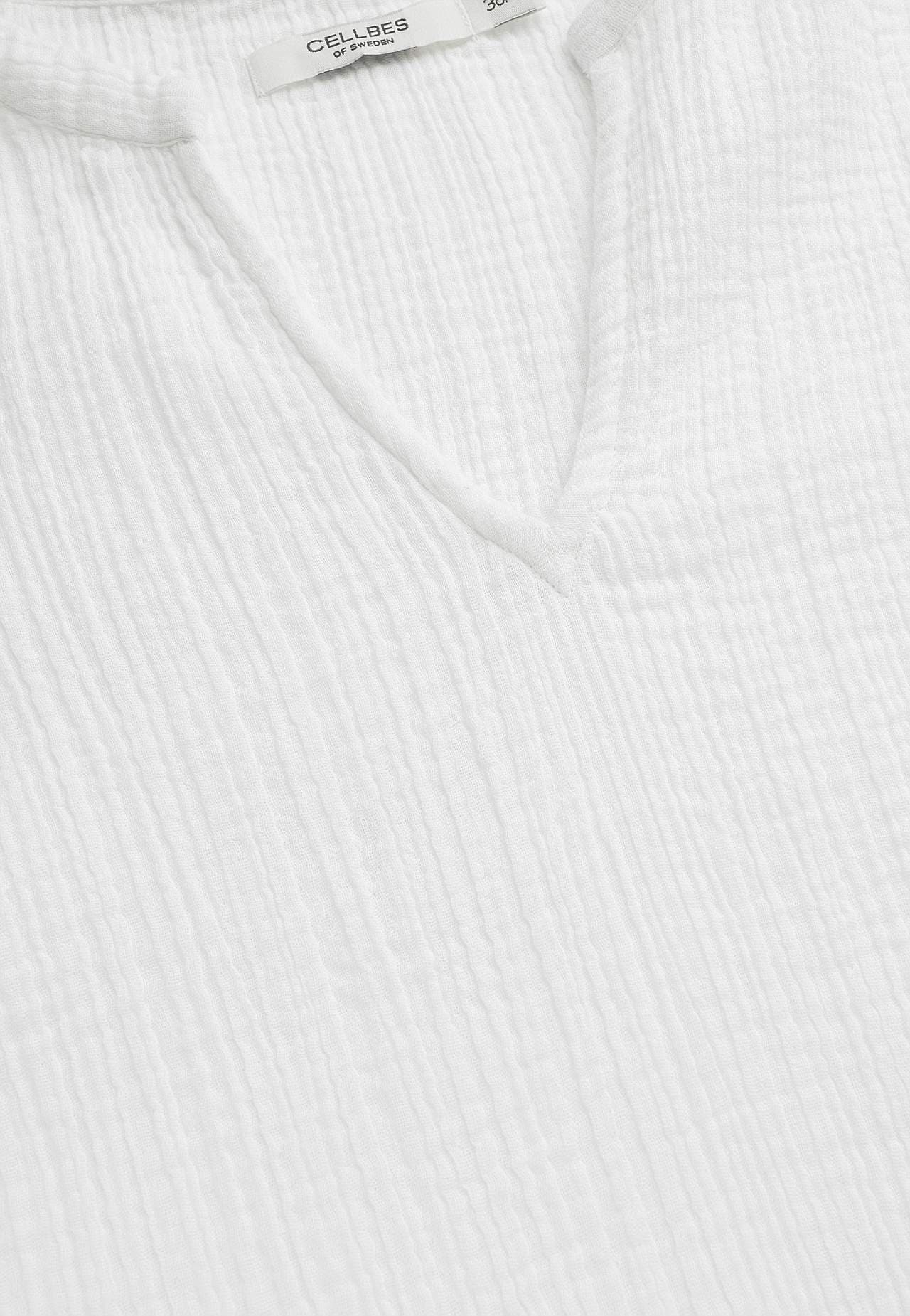 Blus i krinklad bomull