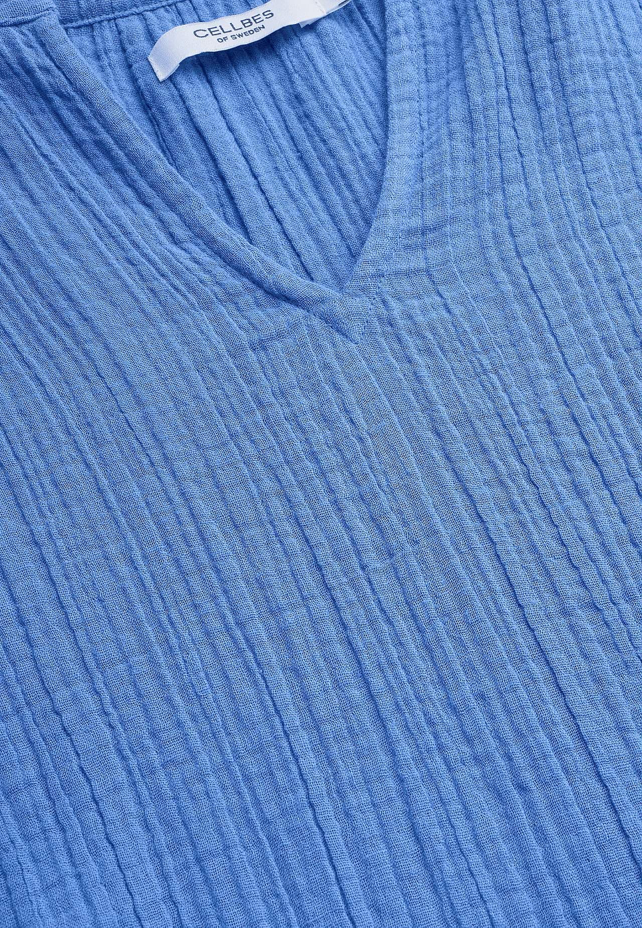 Blus i krinklad bomull
