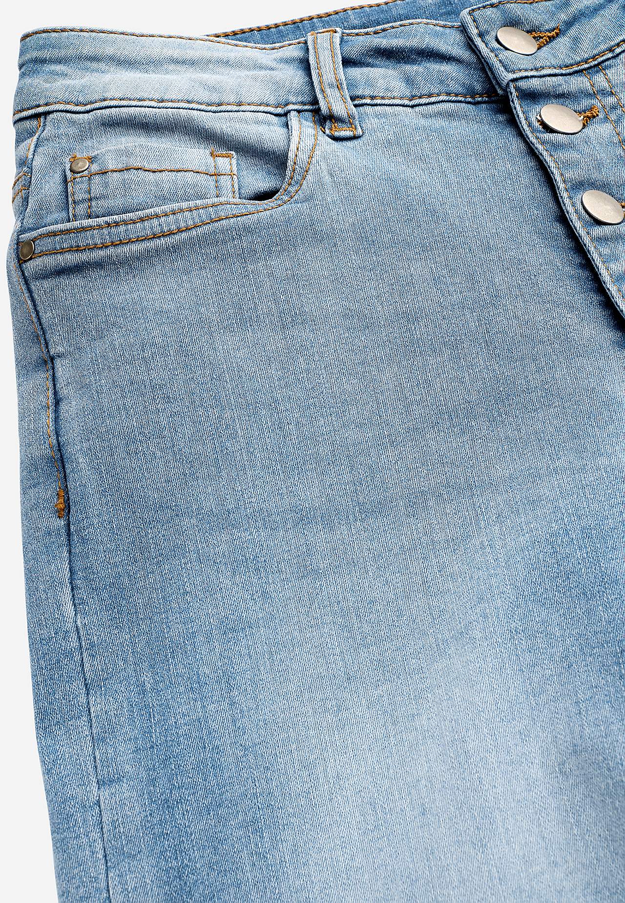 Caprijeans med knappgylf