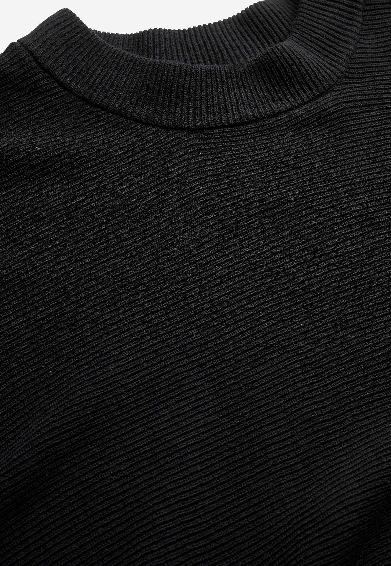 Finstickad poncho