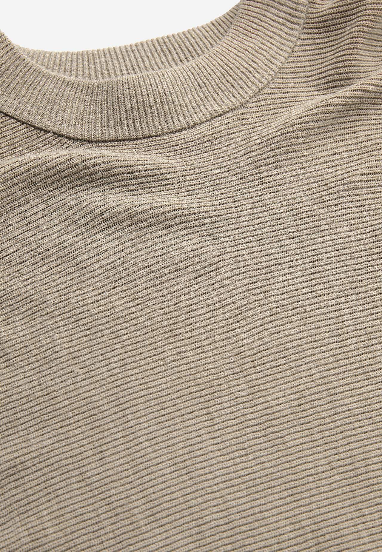 Finstickad poncho