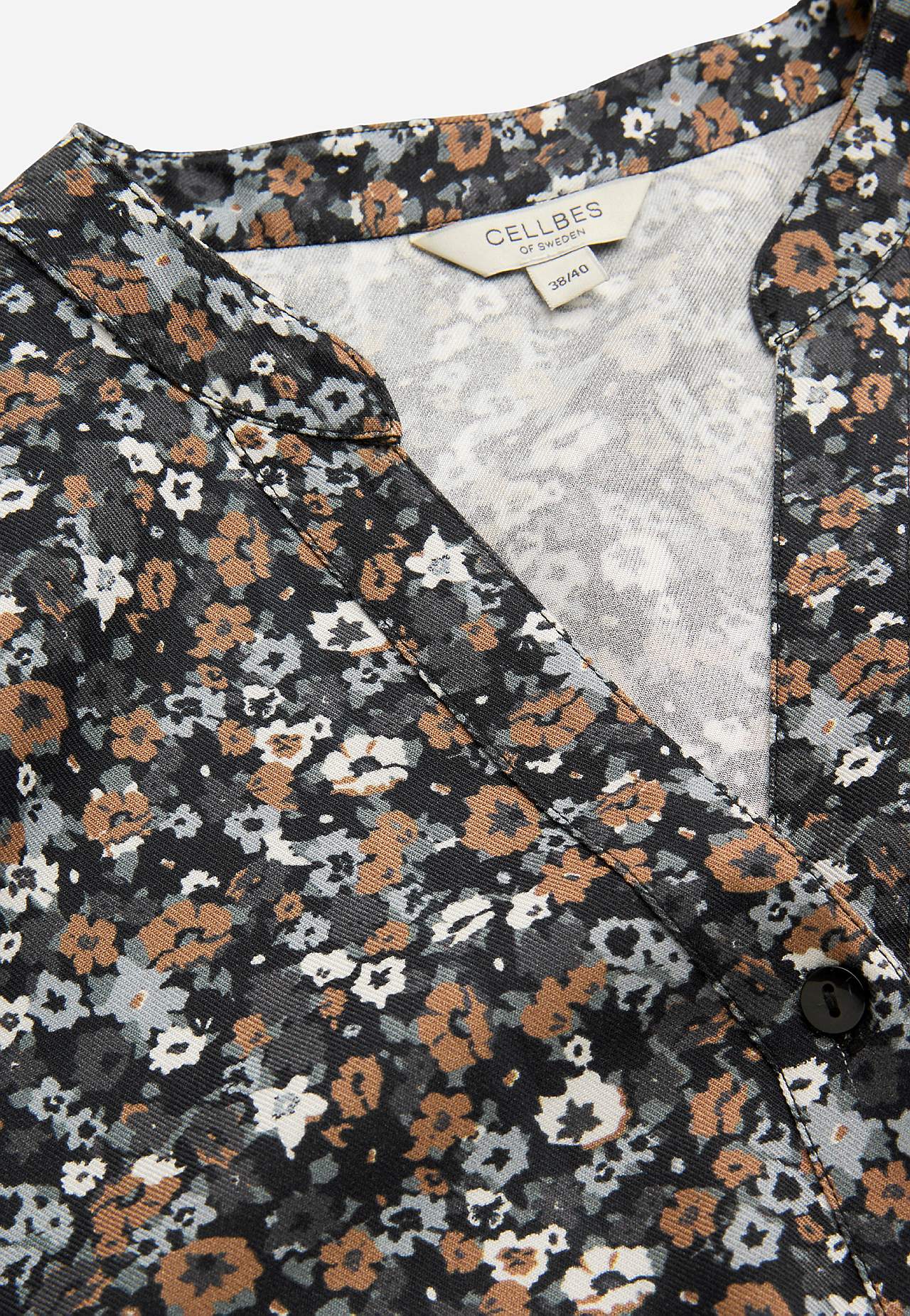 Vävd tunika med knappar