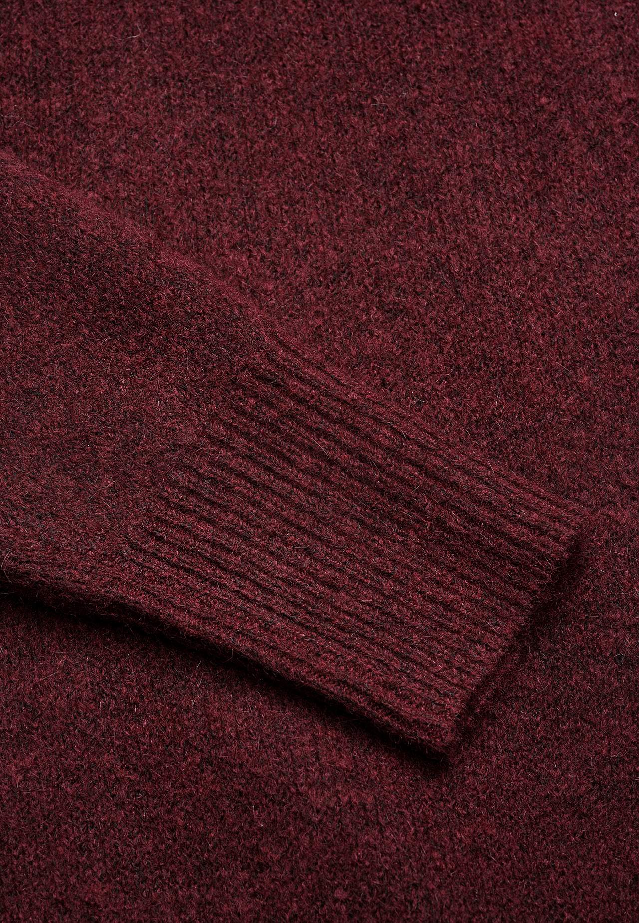 Stickad tunika med slitsar