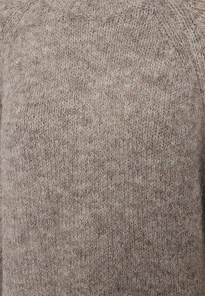 Stickad tröja med raglanärmar