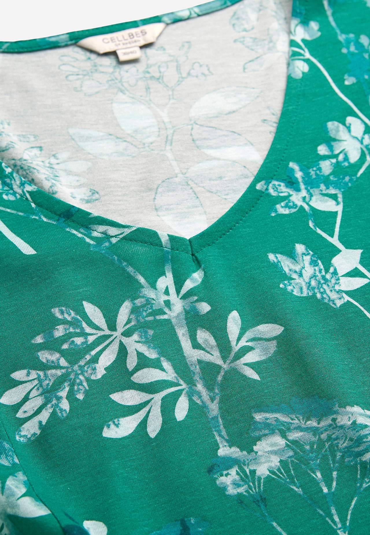 Mönstrad trikåklänning med fickor