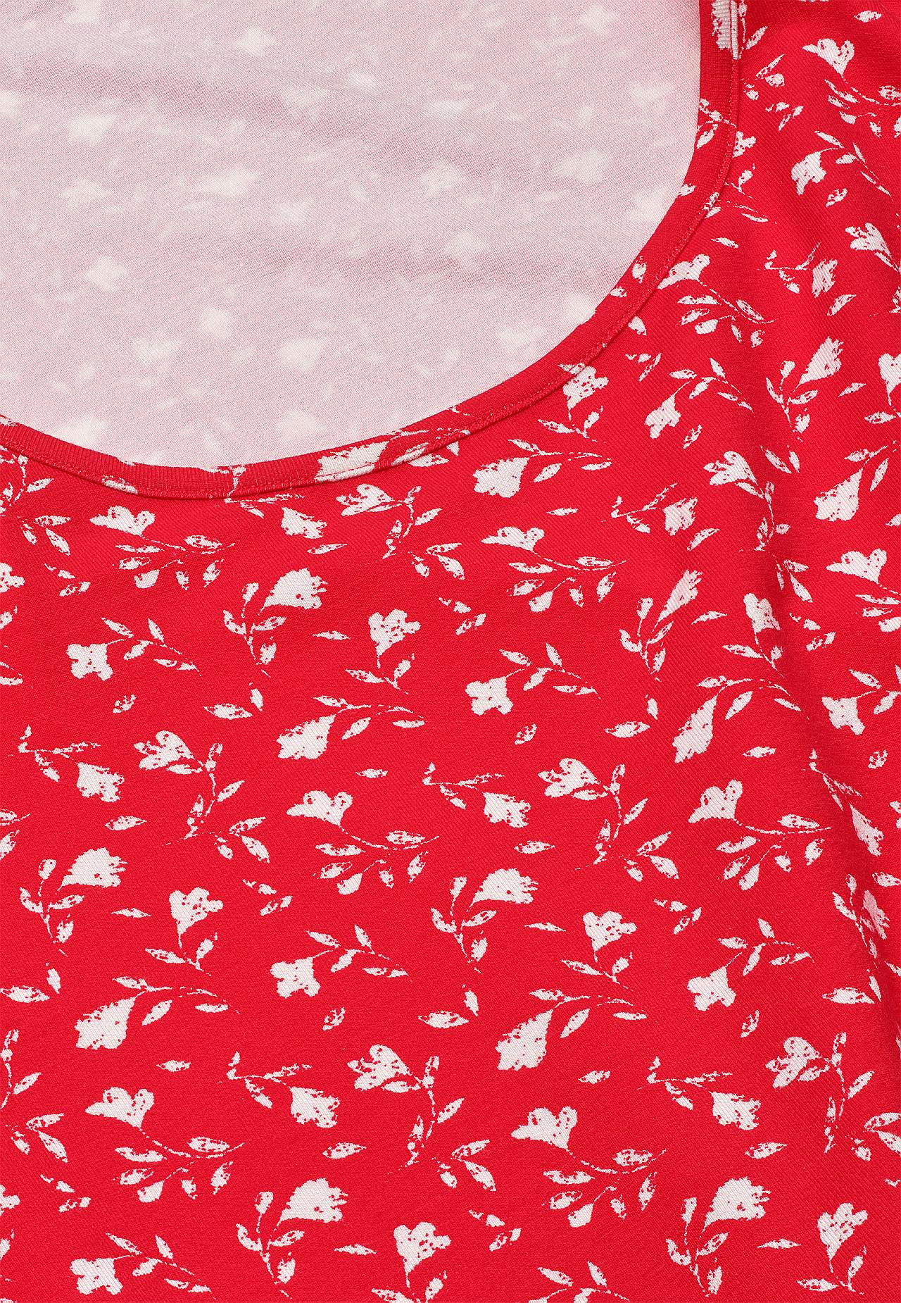 Blommönstrad trikåtunika