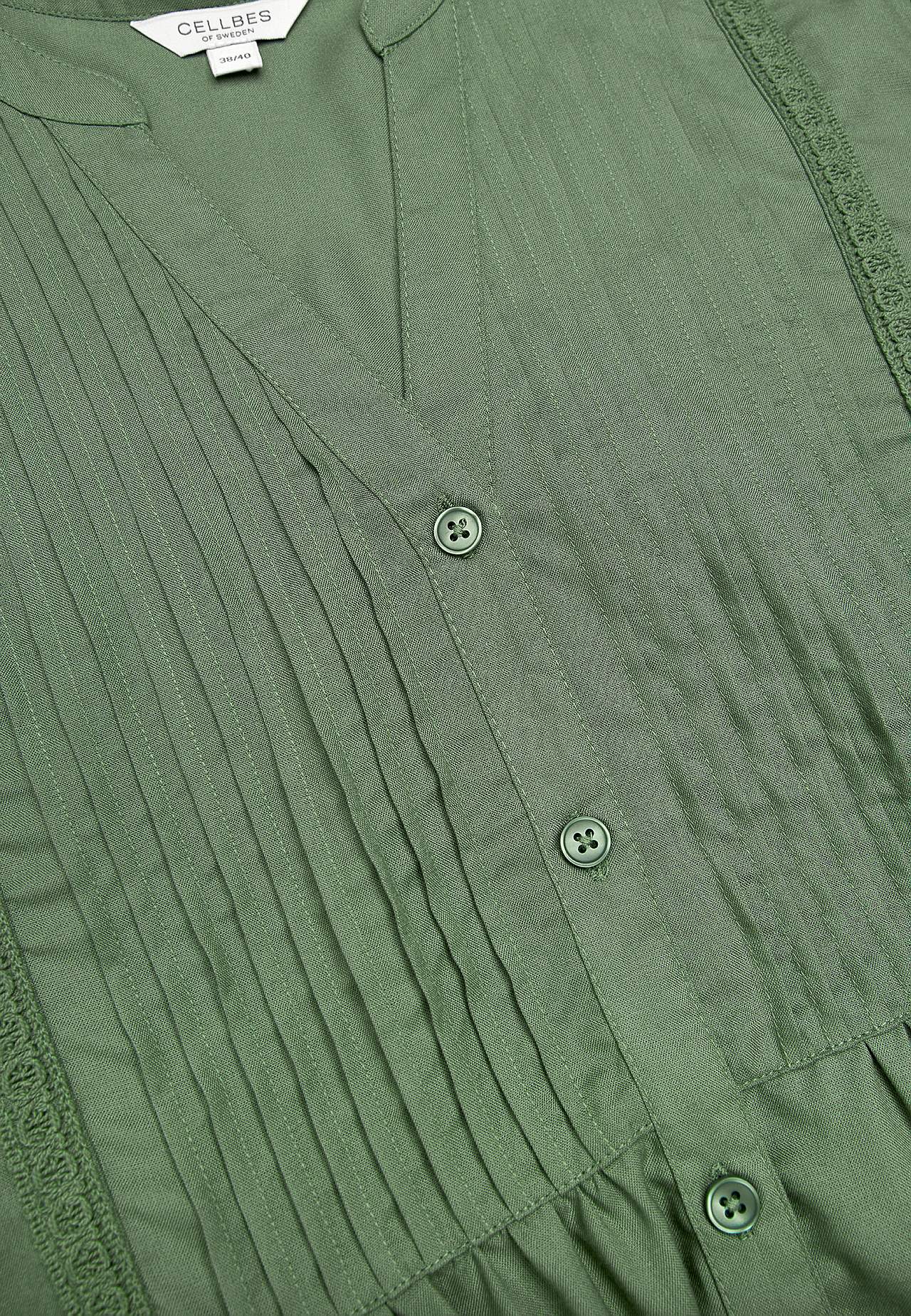 Vävd tunika med spetsdetaljer