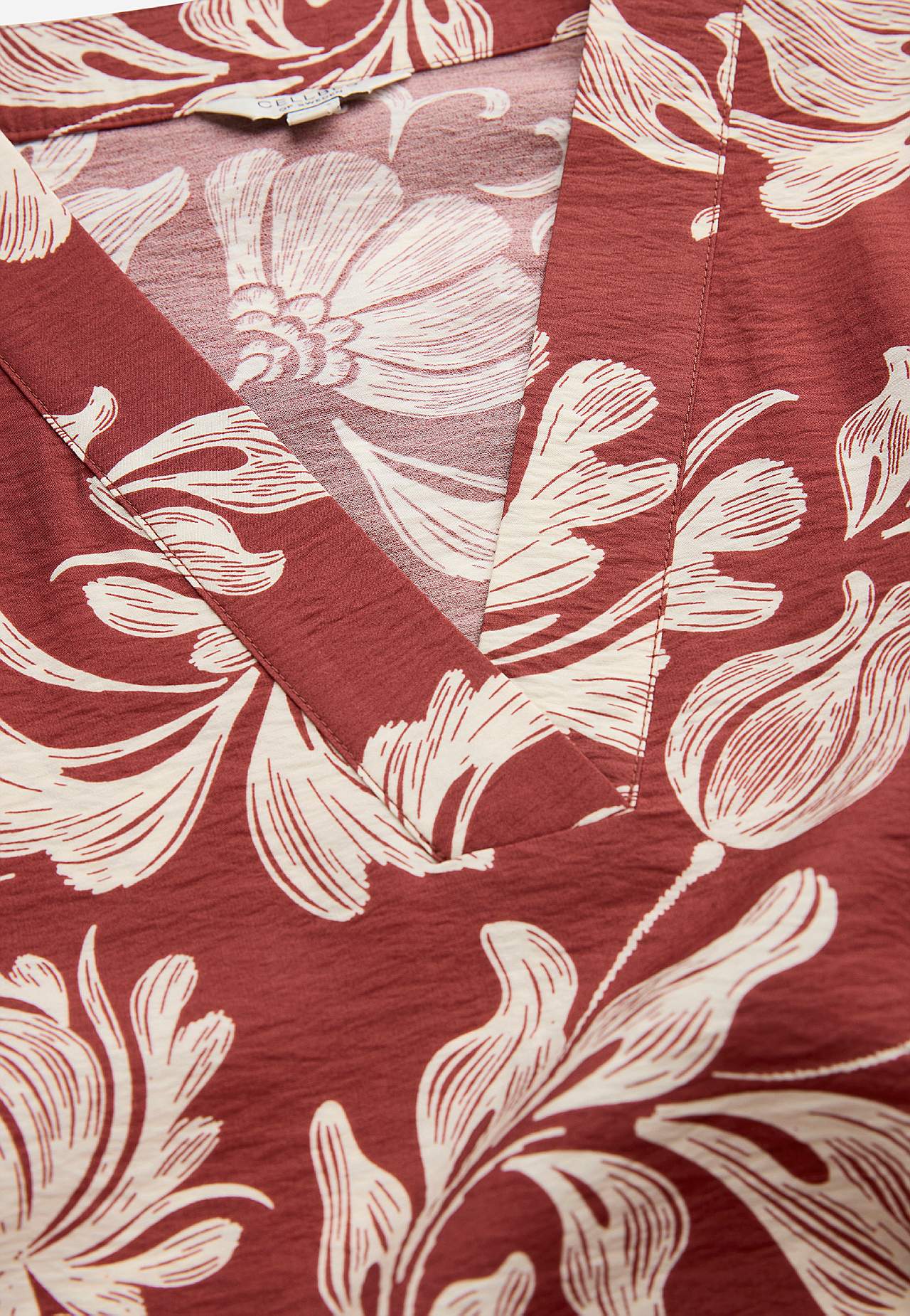 Mönstrad klänning med fickor