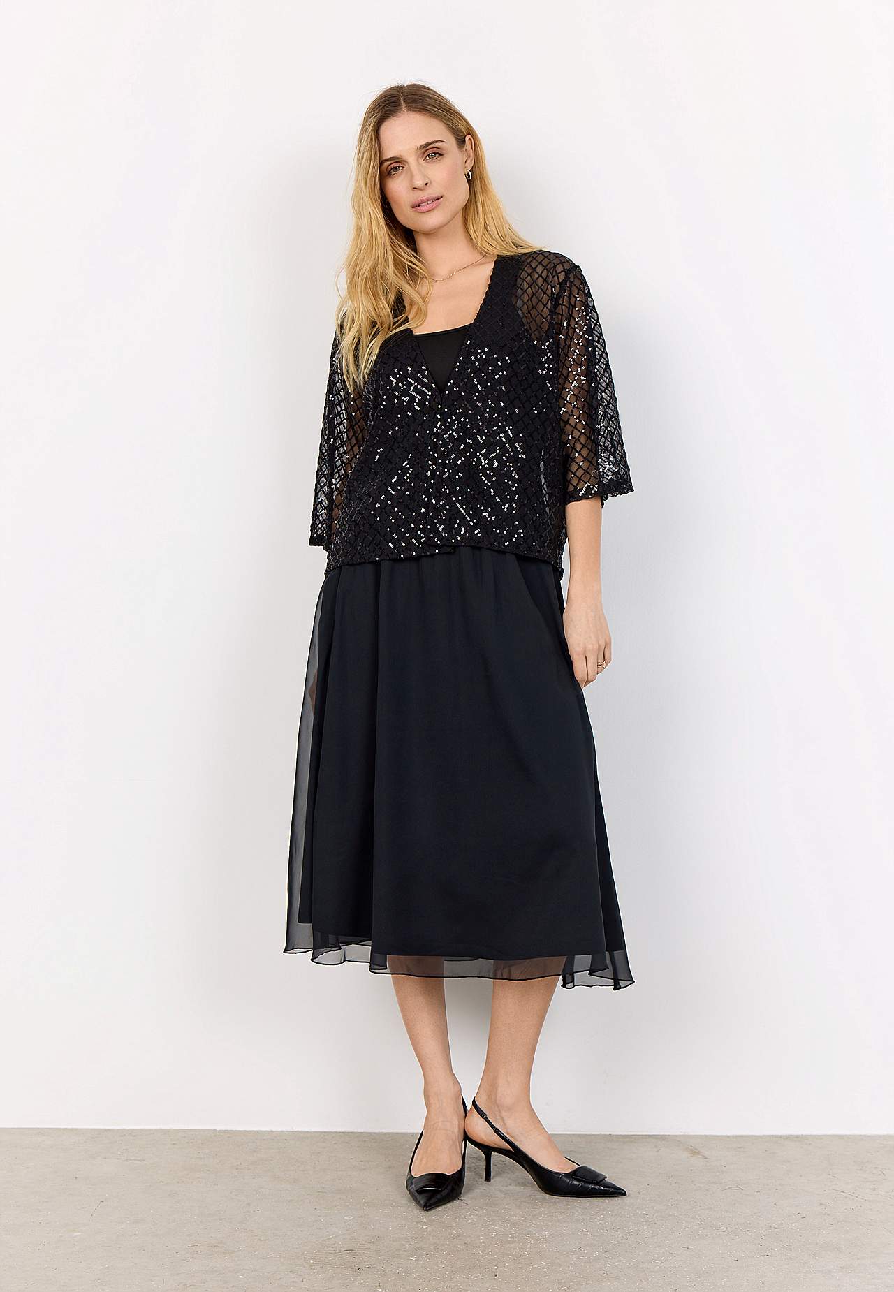 Elegant innejacka med paljetter