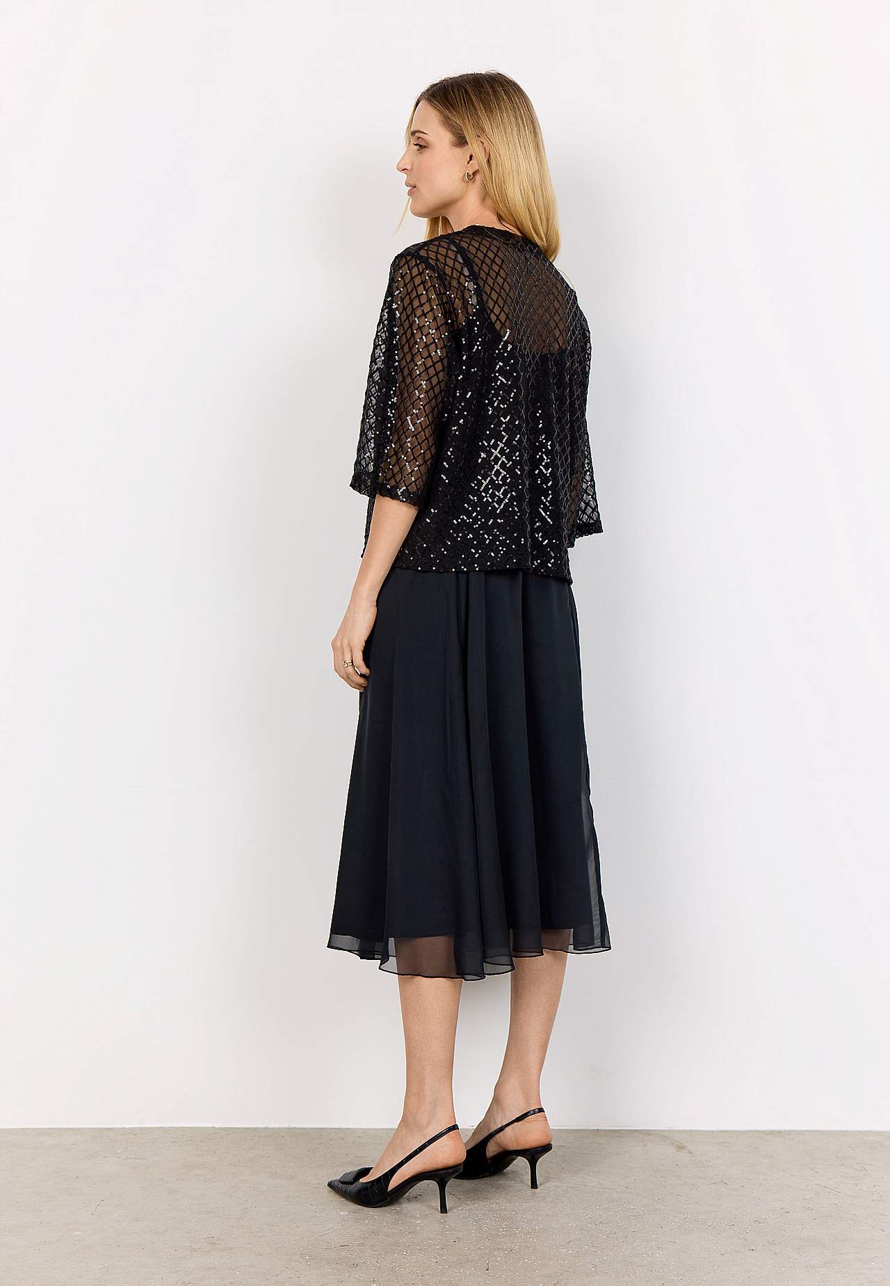 Elegant innejacka med paljetter