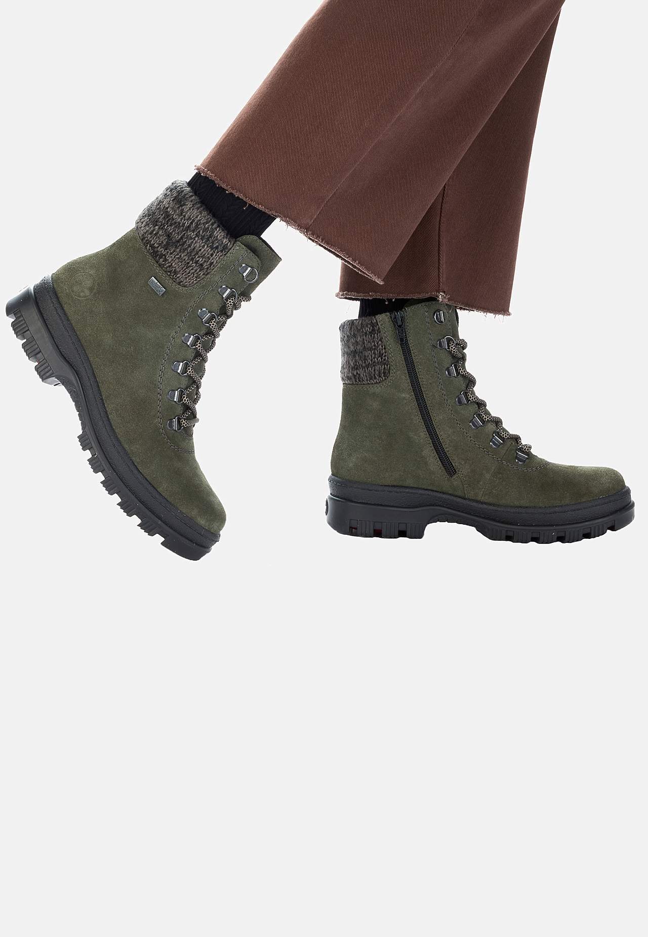 Skinnkänga med infällbara broddar