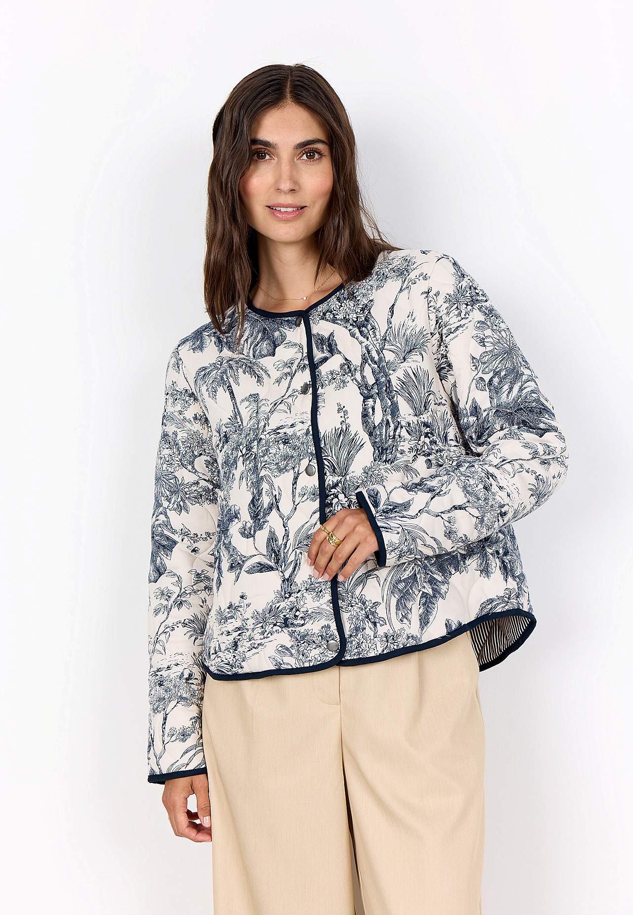 Vändbar, quiltad jacka