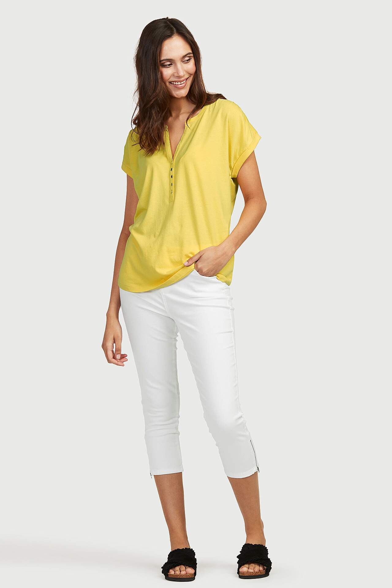 Trikåtopp med metallknappar