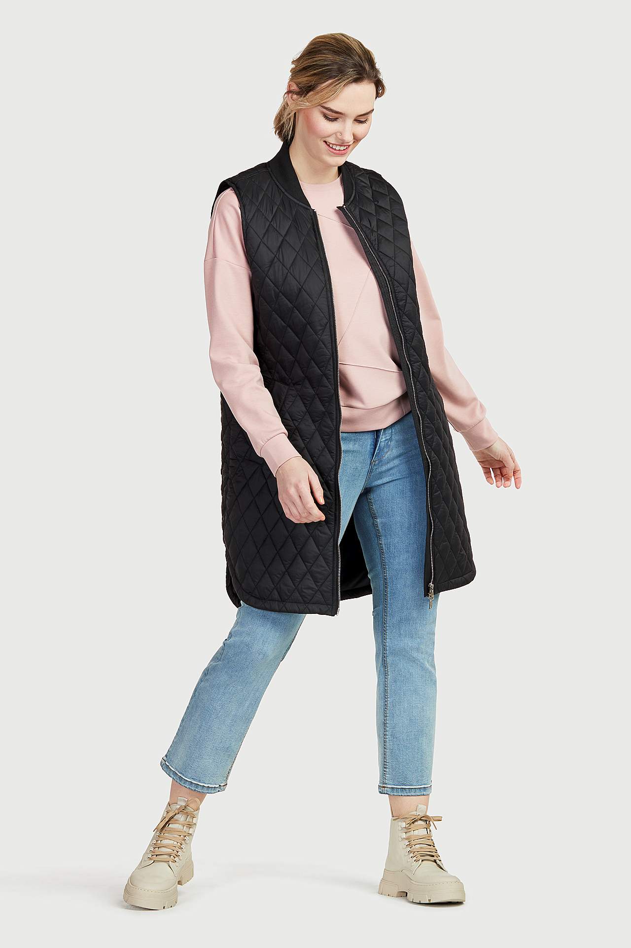 Quiltad, lång väst