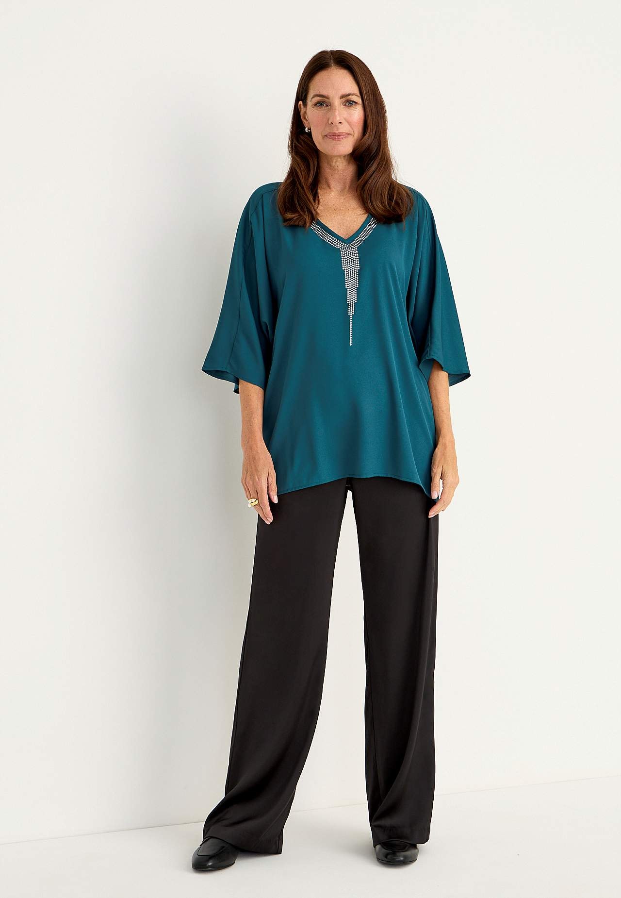 Festblus med nitdetaljer