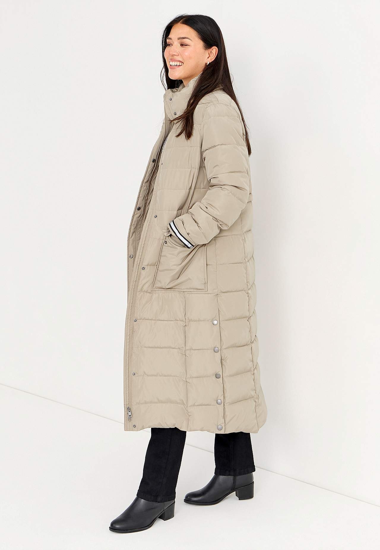 Lång, vadderad kappa