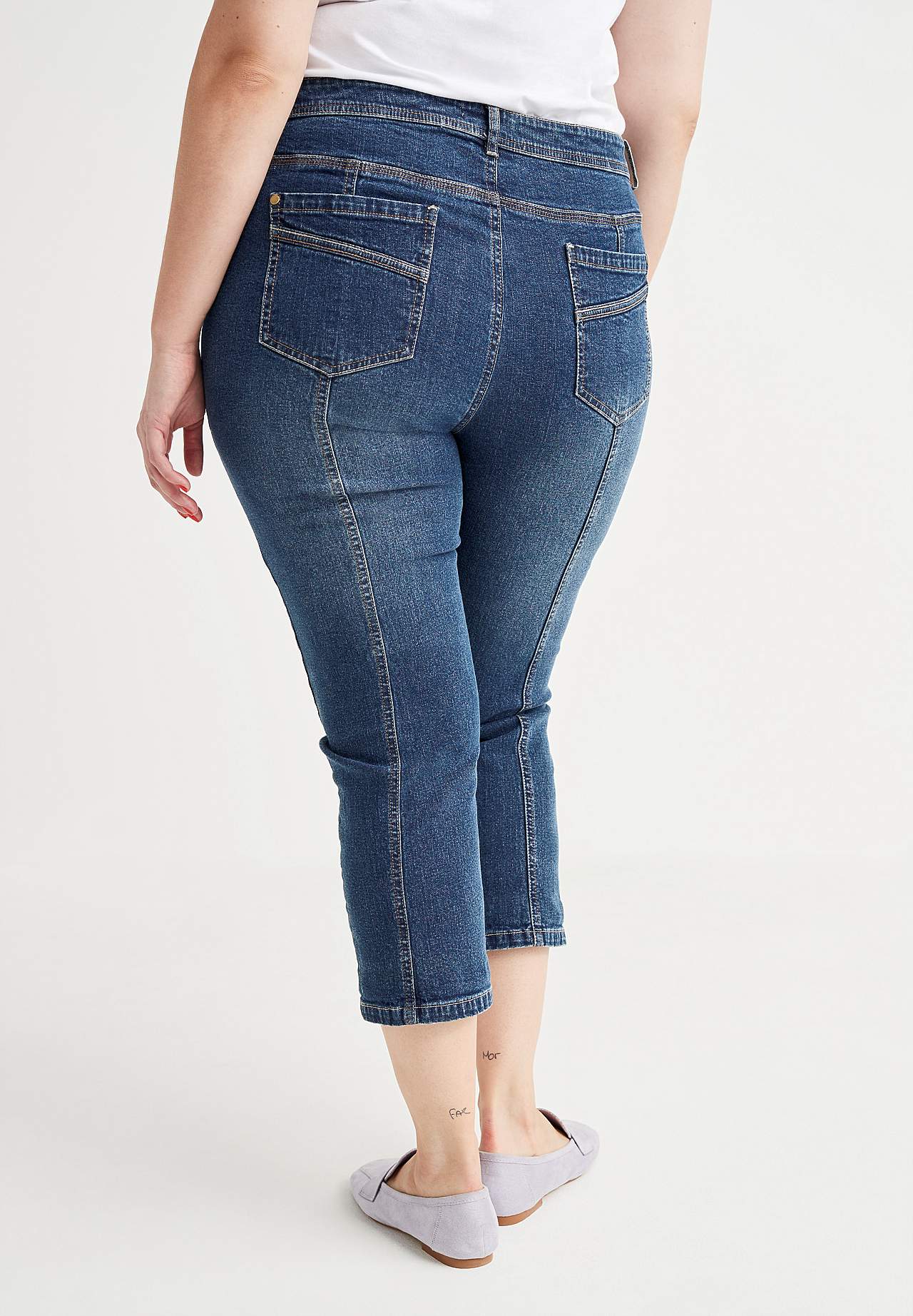 Caprijeans med femficksdesign