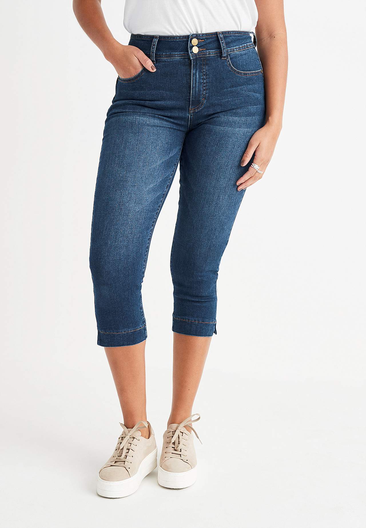 Stretchiga caprijeans med shaping-effekt