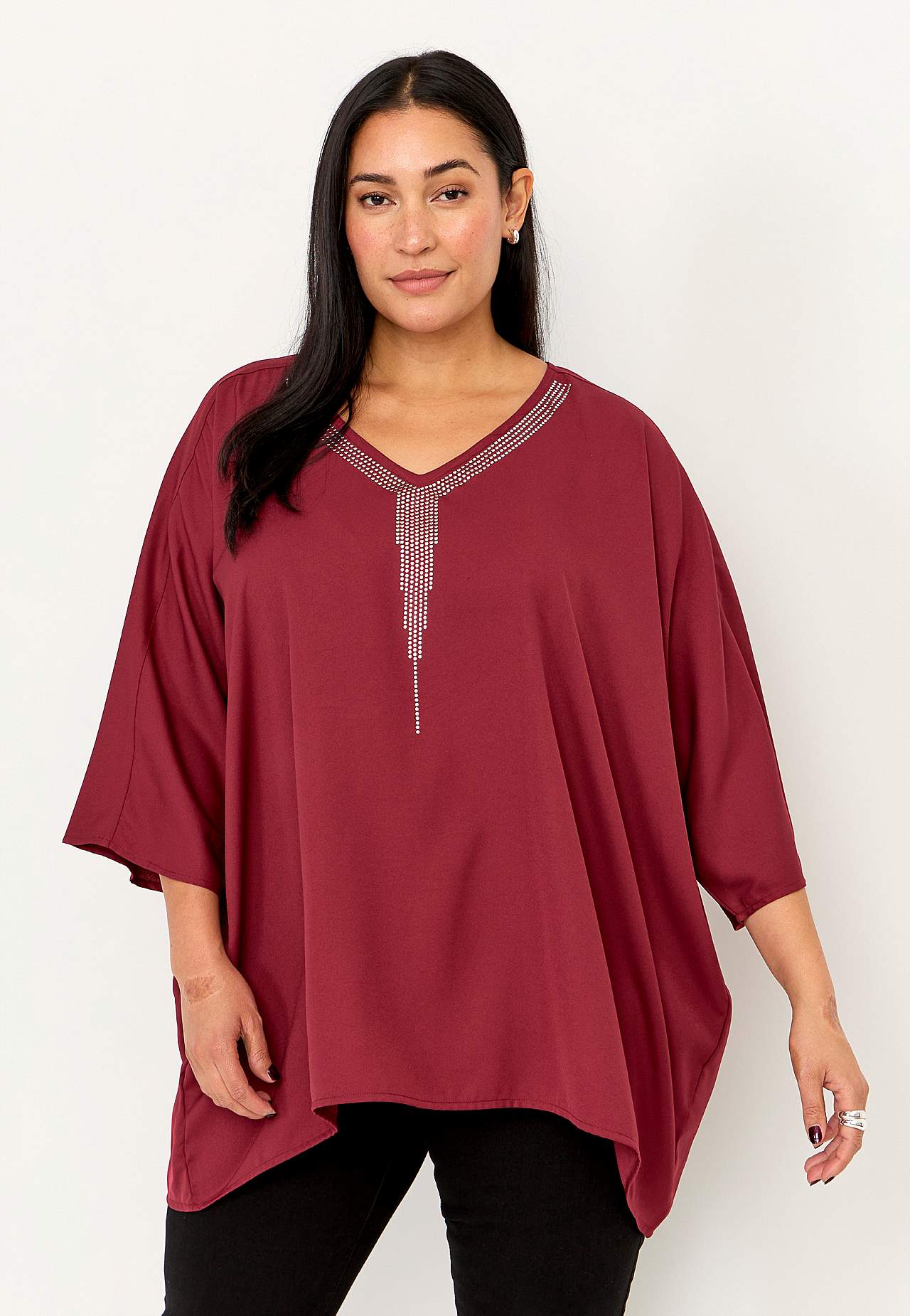 Festblus med nitdetaljer