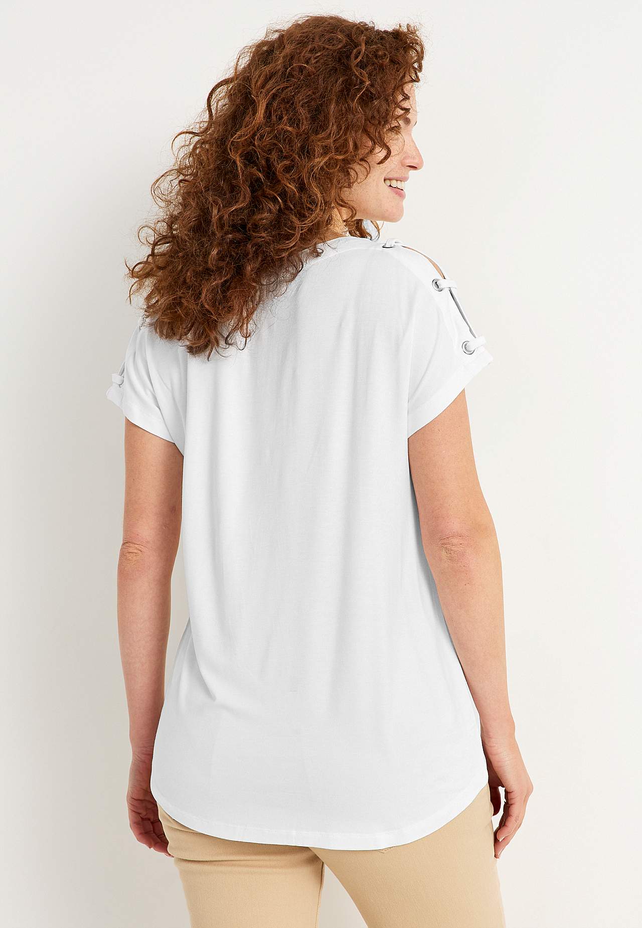 Trikåtopp med dekoration på axeln