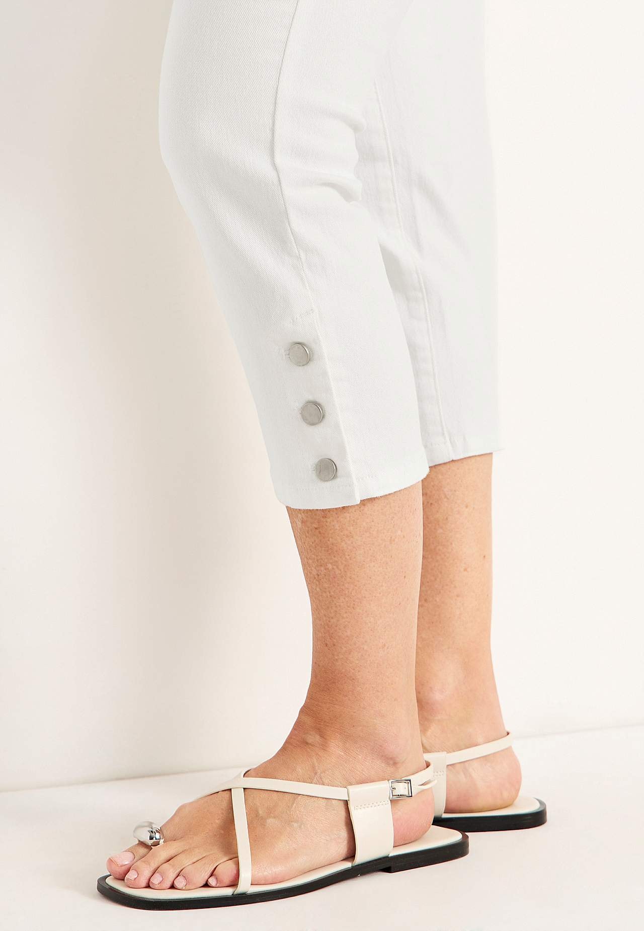 Caprijeans med femficksdesign