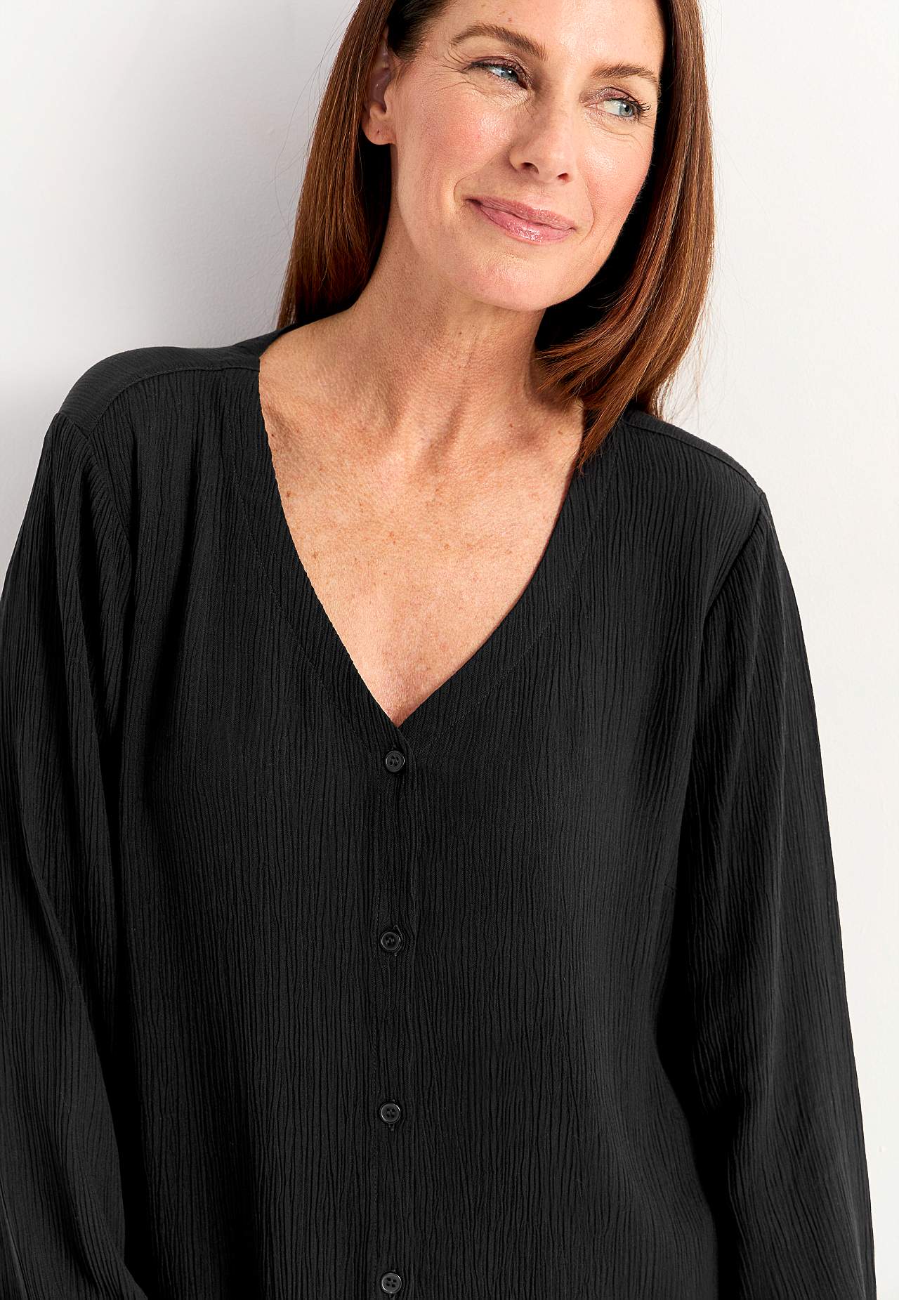 Blus med crepe-kvalitet