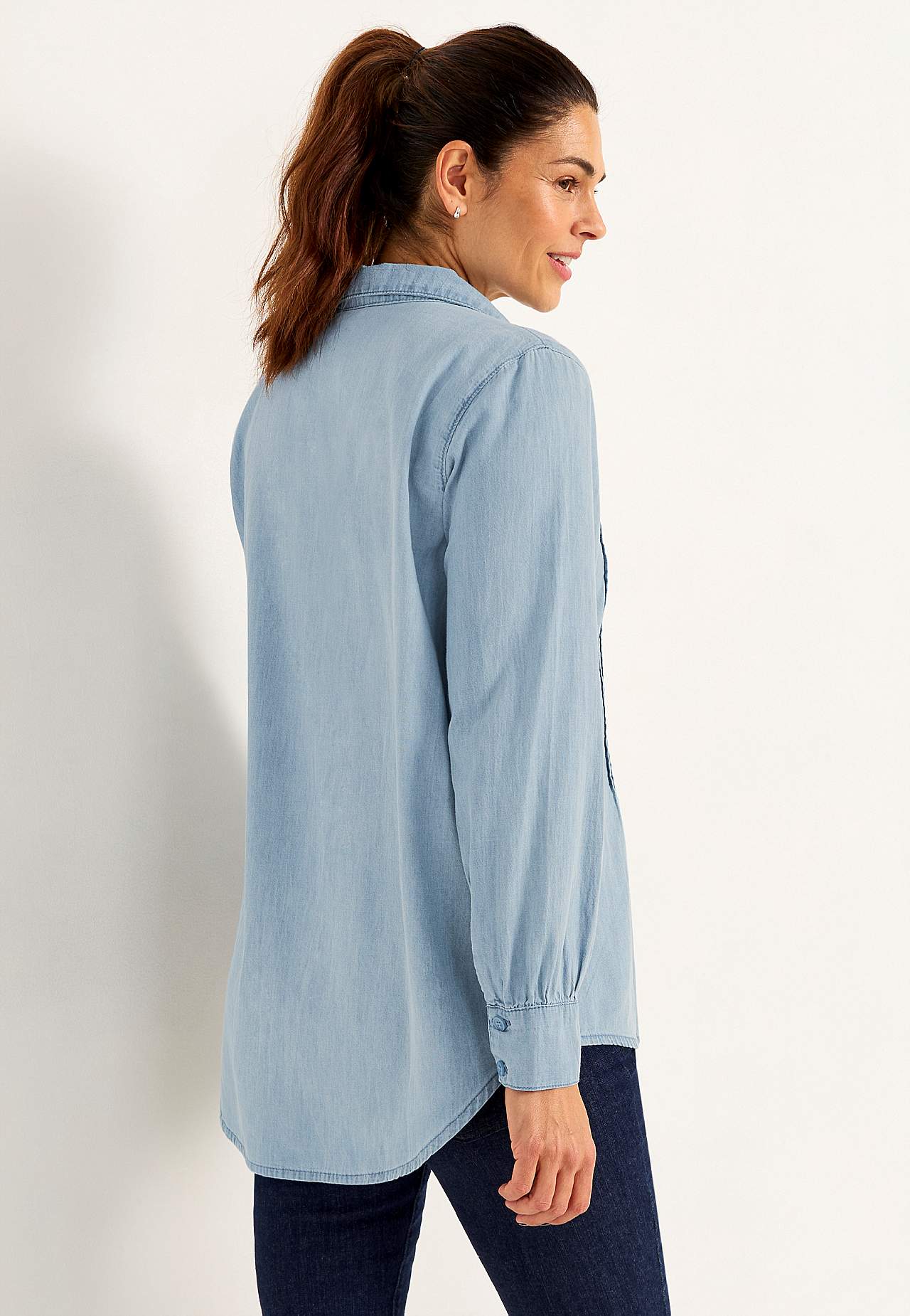 Denimblus med sydda veck