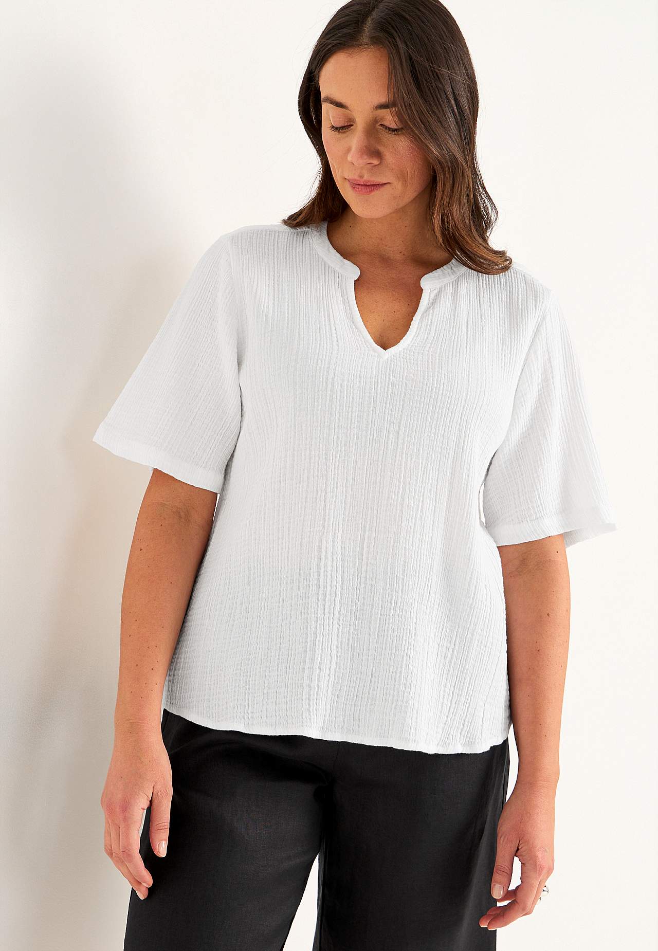 Blus i krinklad bomull