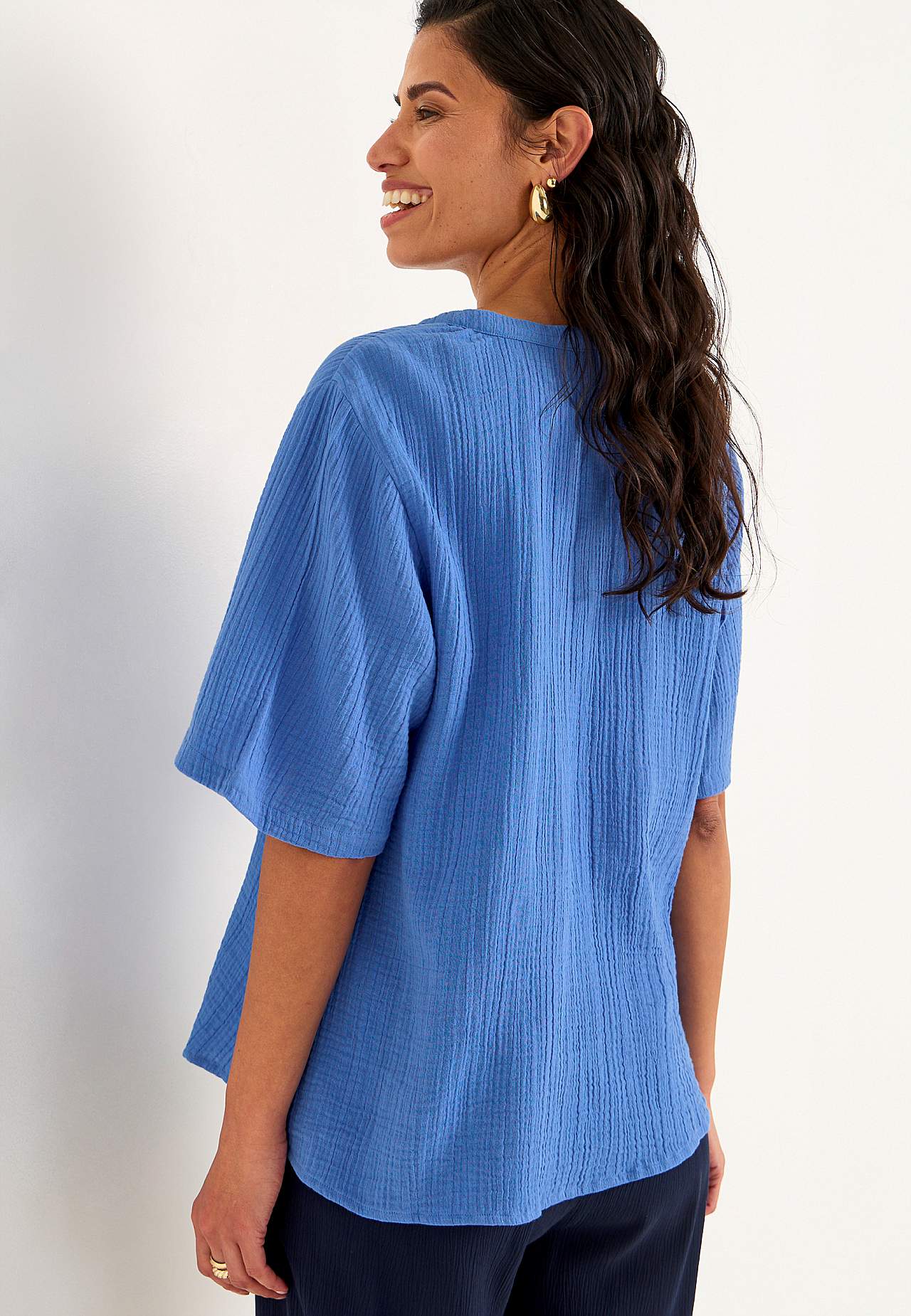 Blus i krinklad bomull